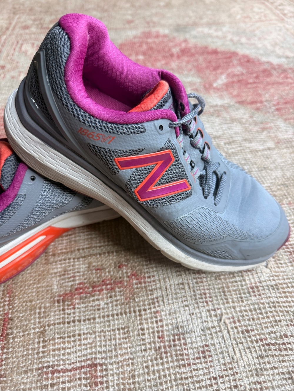 New Balance Gray Athletic Sneakers with Pink and Orange Accents